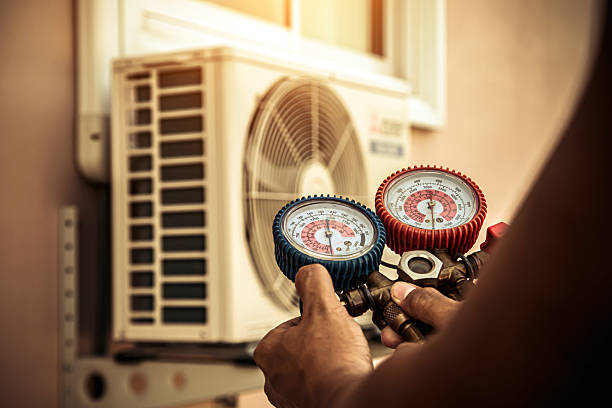 Professional Air Conditioning Service technician working in Renfrew, PA